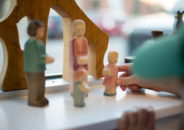 Wooden figures on a child’s table